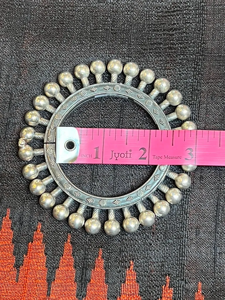 SILVER BURST: RAJASTHANI TRIBAL HINGED BANGLE