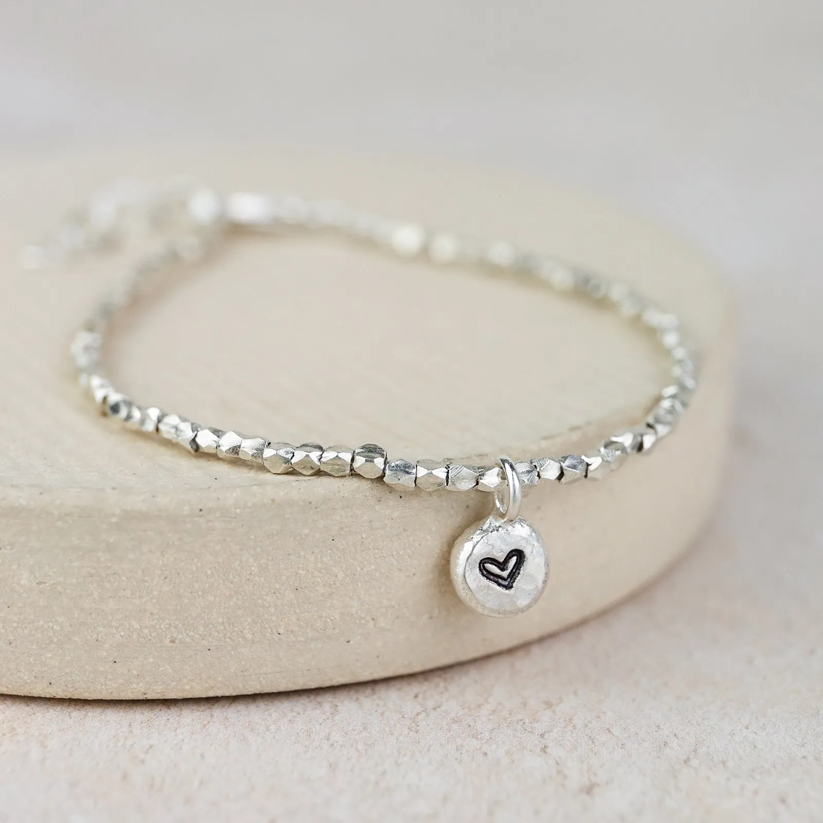 Sterling Silver Nugget Charm Bracelet (One Charm)