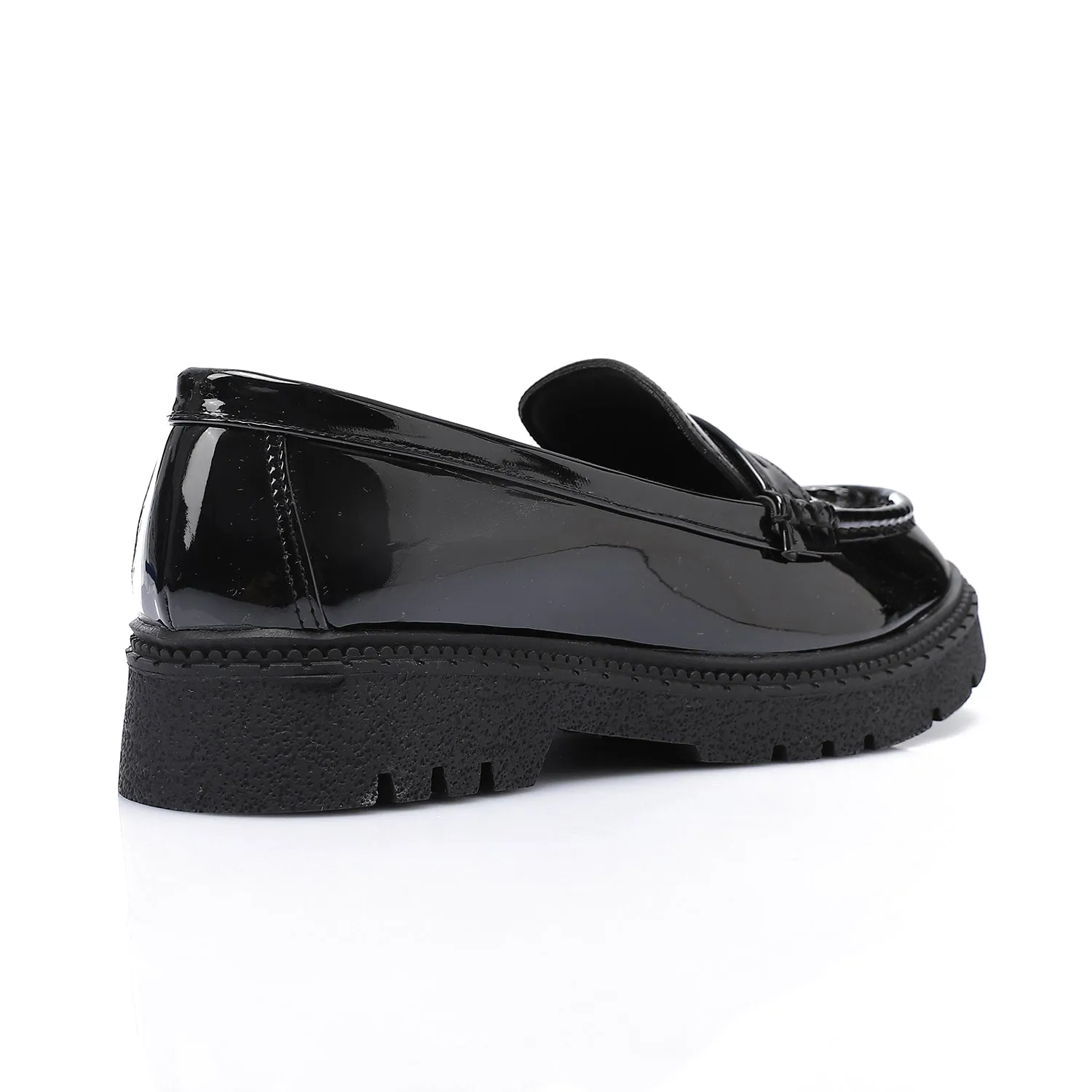 Tassel loafers in shinny black faux leather